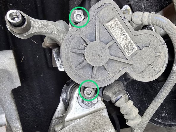 Gently insert the male end of the spindle into the parking brake motor as shown