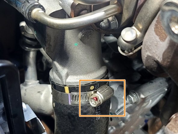 Use 10mm socked and ratchet or Phillips screwdriver to remove clamp from FMIC Inlet hose
