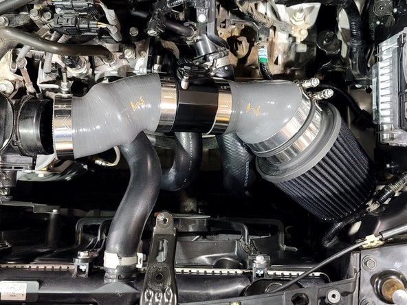 Place SRI in engine bay as shown