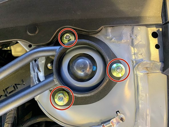 Install the three (3) OEM flange nuts
