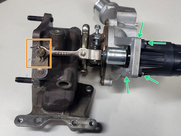 Pull pin from wastegate arm using pliers