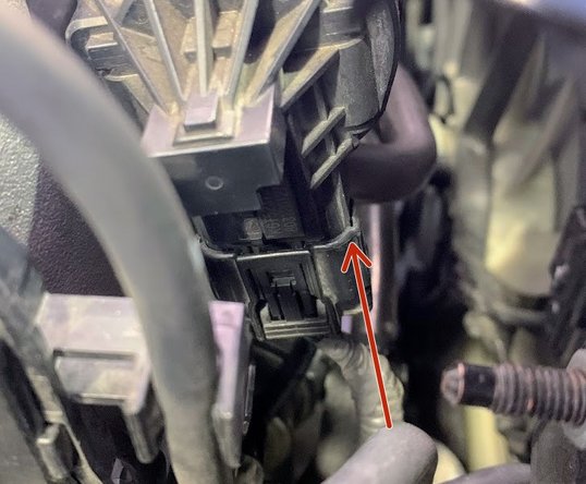 Follow the wire up and reconnect the other end of the electrical harness as shown
