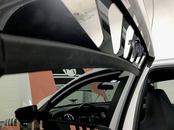 The window vent should fit snug and have minimal deflection in/out when pushed against and should not slide forward and back