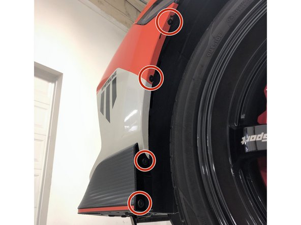 Secure the bumper to the fender liner using the four OEM Phillips head screws removed in step 4. Tighten until snug using a Phillips screwdriver