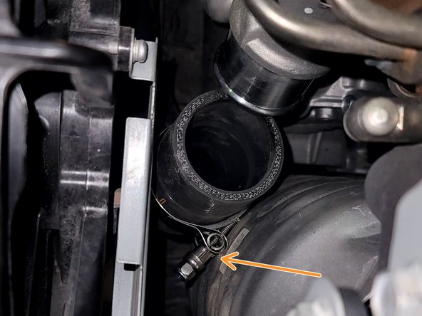 Place provided 54-62mm hose clamp over turbo outlet silicone as shown