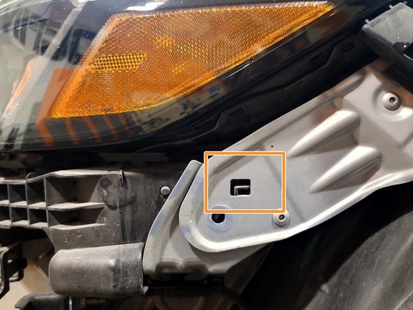 Clip headlight into position at the two upper and one side clips