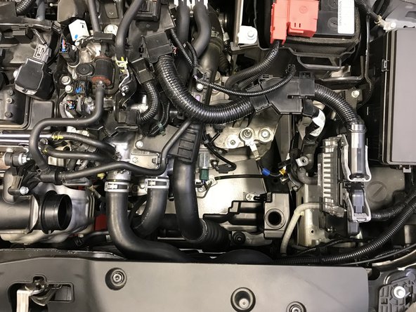 With the hose loose, remove the entire airbox from the engine bay