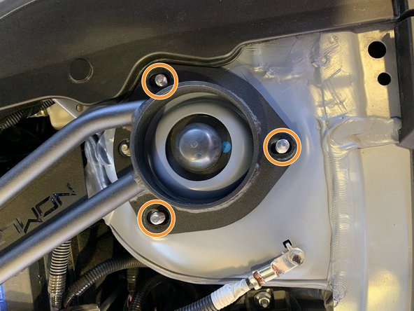 Place each end of the strut bar down on the strut tops over the studs