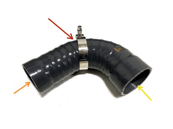 Place a provided 67-75mm T-Bolt clamp onto the throttle body silicone as shown
