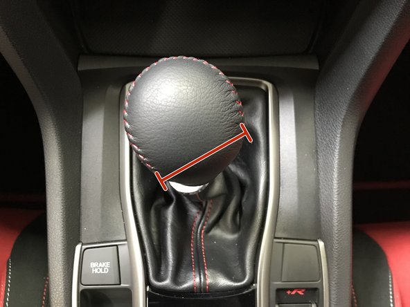 Hand thread the 27WON shift knob onto the shifter rod until it bottoms out