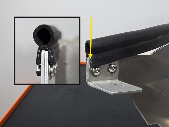 Starting at the inlet bracket (yellow arrow) press the weather stripping over the shroud as shown