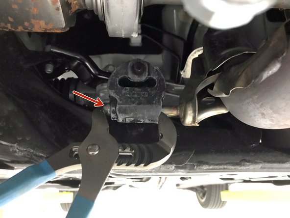 Apply a small amount of silicone spray to the end of the hanger rod