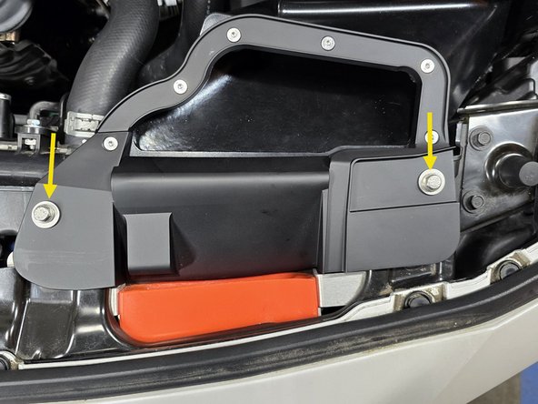 You may need to move the airbox towards the passenger side of the car to get these holes to align properly