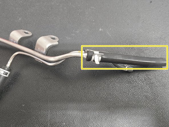 Remove clamp as shown