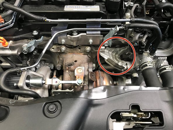 Locate the wiring bracket to the driver's side of the turbo