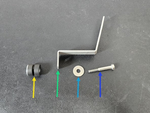 The lower airbox bracket will mount in the order shown