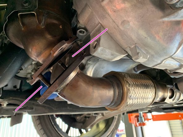 Usually the studs will remain in the downpipe causing issues when removing the downpipe. Pry the downpipe from front pipe by sticking a screwdriver in between the downpipe and the forward pipe