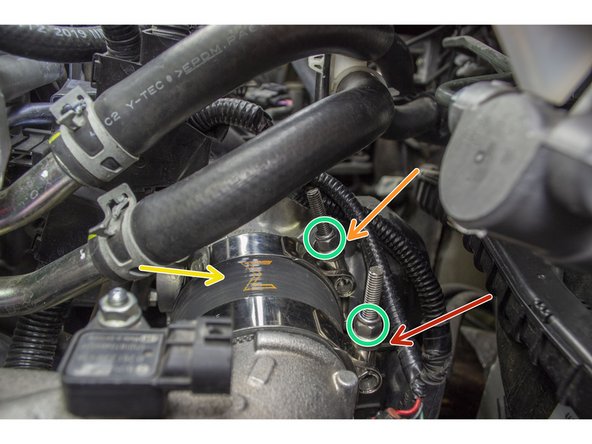 Loosely place the 67-75 clamp on the smaller side of the silicone. Orientate the 67-75 clamp as shown