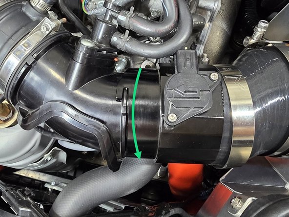 Press the MAF housing onto the EVAP elbow, then twist it towards the front of the car to lock it in