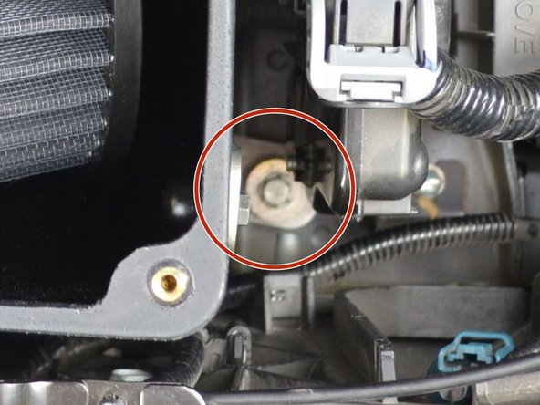 Insert the OE bolt into the long bracket