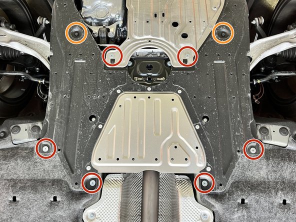 Reinstall the six (6) Phillips heads screwdrivers circled in orange