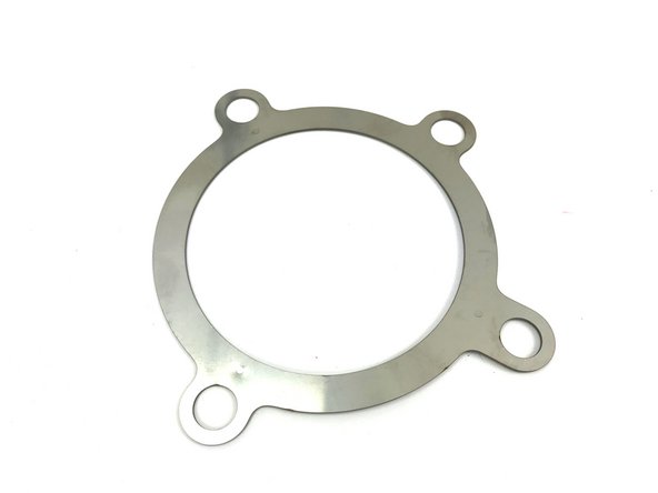 Locate the provided turbine outlet gasket, four (4) M10 studs, and four (4) M10 crimp nuts