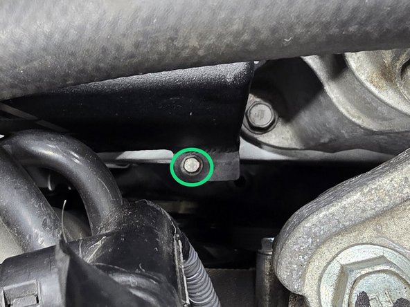Integra shown. Si similar, but will use provided M6 flange nut to secure this mounting location. Snug flange nut against M6 bolt