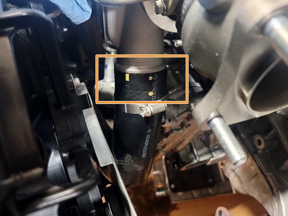 Slide rubber inlet hose onto turbocharger