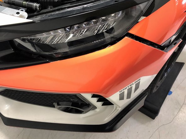 The second image shows what you are looking for to lift upwards. Take your time and take care to not damage the vehicle