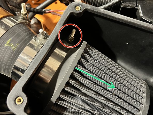 Using the 10mm socket and ratchet loosen the 10mm lock nut on the t-bolt clamp