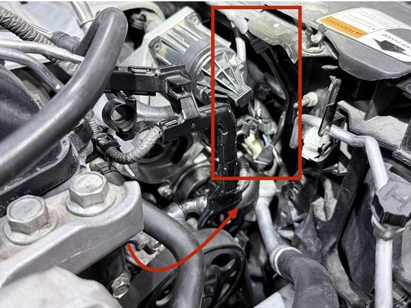 Unplug connector from wastegate solenoid. Then move entire line towards passenger fender area of the vehicle