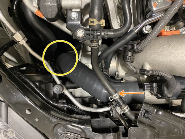 Pull the turbo outlet silicone off the turbo inlet pipe without disturbing interface in yellow circle