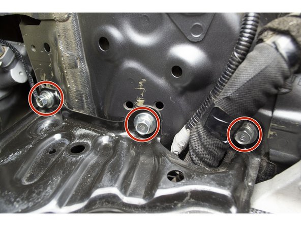 There are three (3) 12mm bolts that must be removed on the top