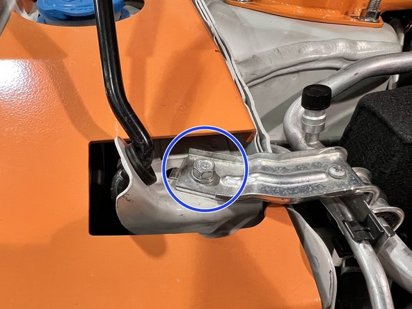 Reinstall the side engine mount bracket with (2) 14mm bolts removed earlier. Torque to snug