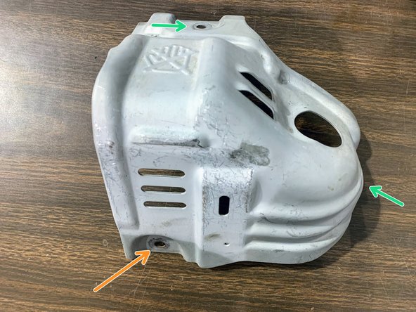 It is very difficult to install the lowest bolt from the heat shield from above (as shown off the car). We advise to install this bolt from underneath