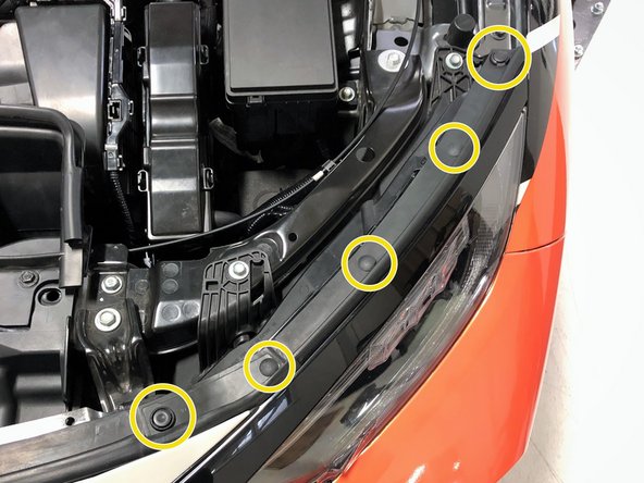 Remove the upper radiator panel from the vehicle