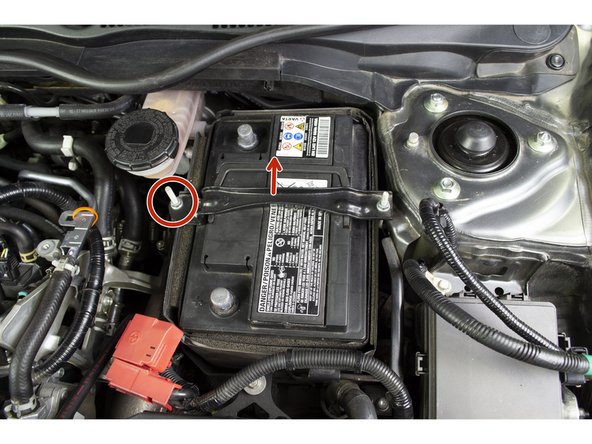 Loosen the nut with a 10mm deep socket and ratchet then remove the Positive cable from the battery. Tuck the cable out of the way