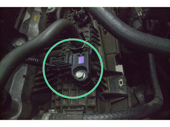 The green circle shows the OEM MAP Sensor located on the intake manifold at the rear of the engine