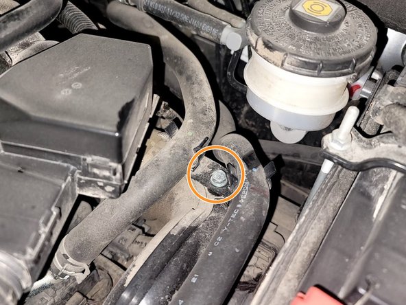 Remove hose bracket using 8mm socket and ratchet