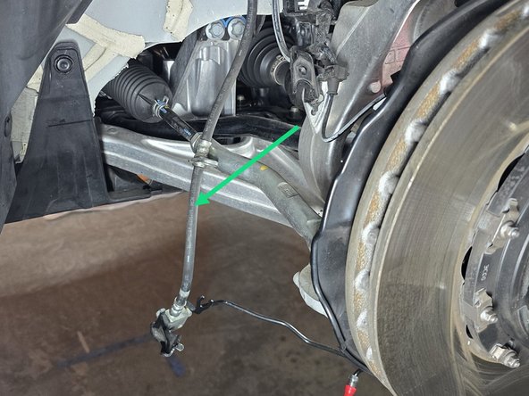 You can use caps and plugs like the ones pictured here, if you have them, to stop the brake line and caliper from leaking. This saves brake fluid and helps not make a mess!