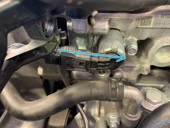 Follow the wire up and reconnect the other end of the electrical harness as shown