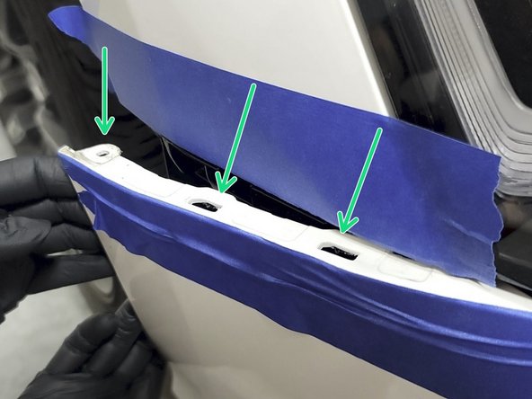 Push three clips at each fender into place