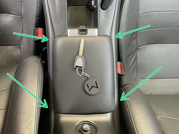 Reclip the center console cover in their respective clip locations