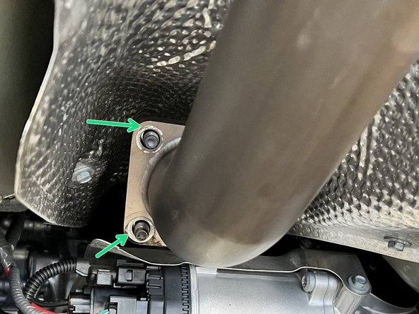 Place forward mid-pipe over front pipe studs as shown