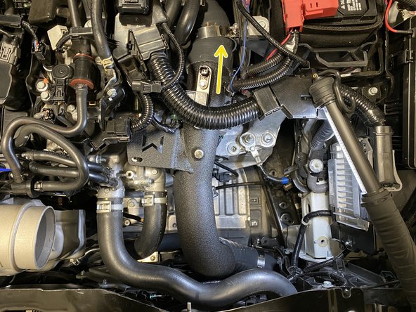 Rotate the cold pipe so the other end goes under the wiring harness towards the throttle body silicone