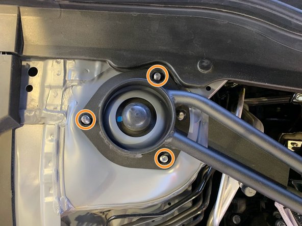 Place each end of the strut bar down on the strut tops over the studs