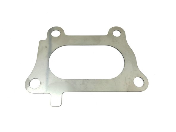 Locate the provided turbine inlet gasket and install as shown