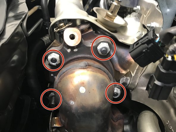 It may be necessary to spray the studs/bolts with a penetrating lubricant before removal.  Apply lubricant if needed and let sit for a few minutes then attempt removal