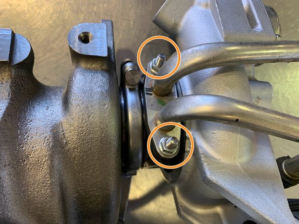 Re-install the Hard Water Lines with the OE (2) 10mm nuts.  Torque to 9 ft-lb