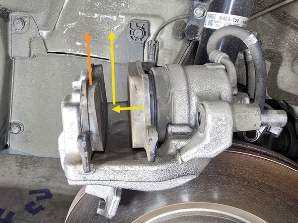 You can set the brake caliper upside down on top of the rotor for easy access to the brake pads but be careful not to bind the brake lines!